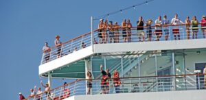 waving-from-cruise-ship This is us waving goodbye to you. Join us next year!